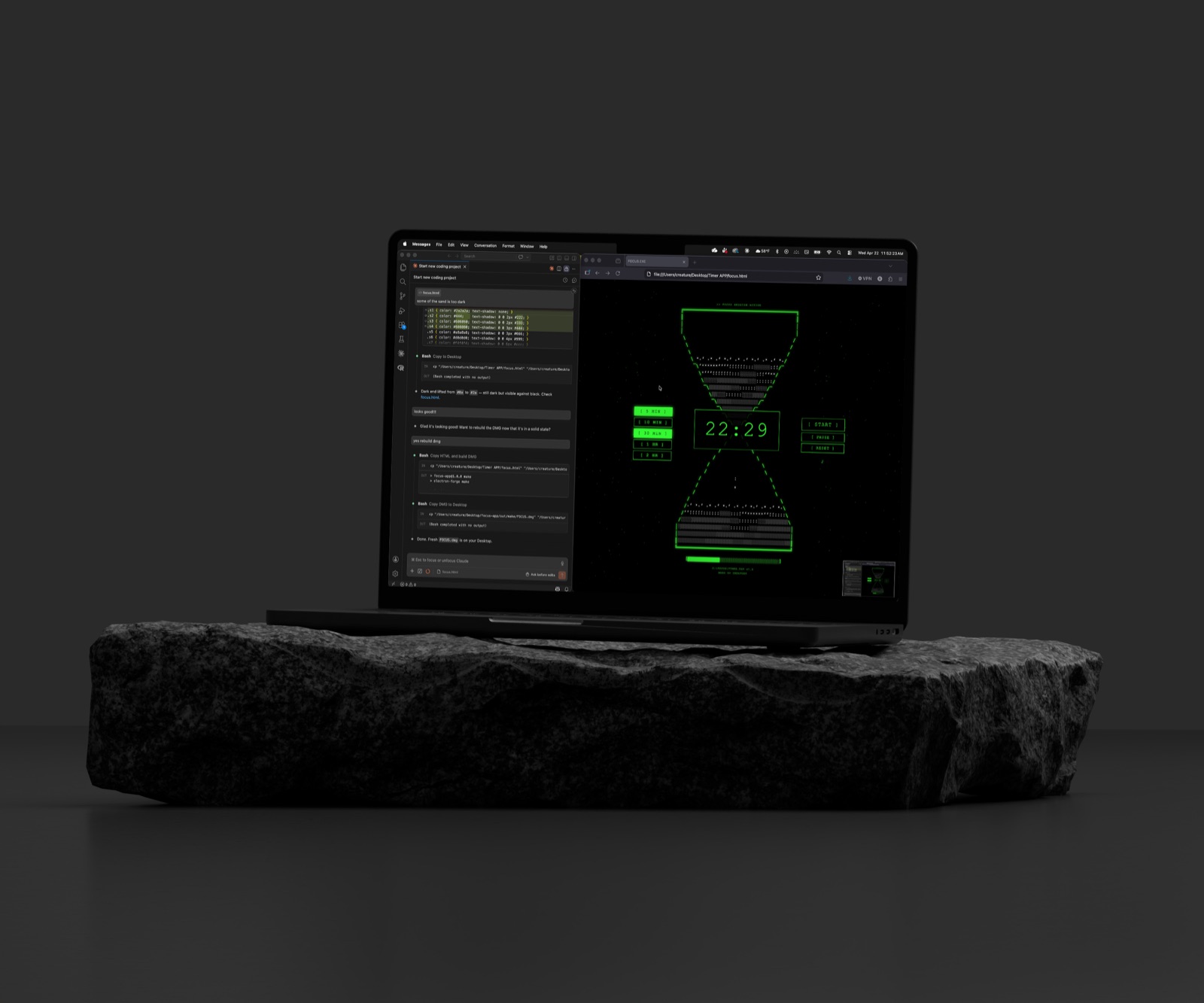 The Pomodoro FOCUS app on a laptop resting on a stone slab in a dark room, a green ASCII hourglass counting down beside the editor it was built in.